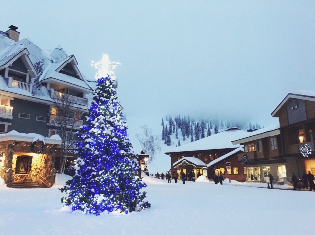 Lit up Christmas tree and the lodge