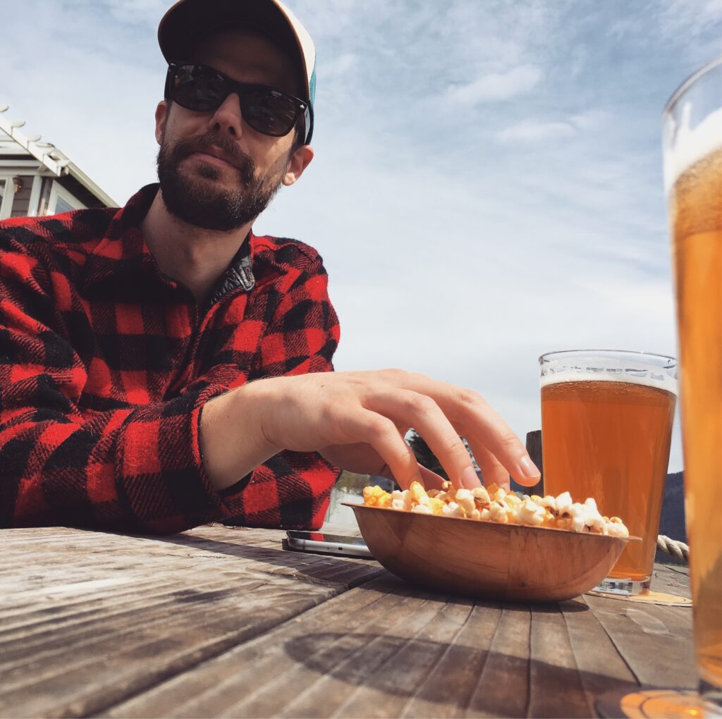 Andy having beer and popcorn