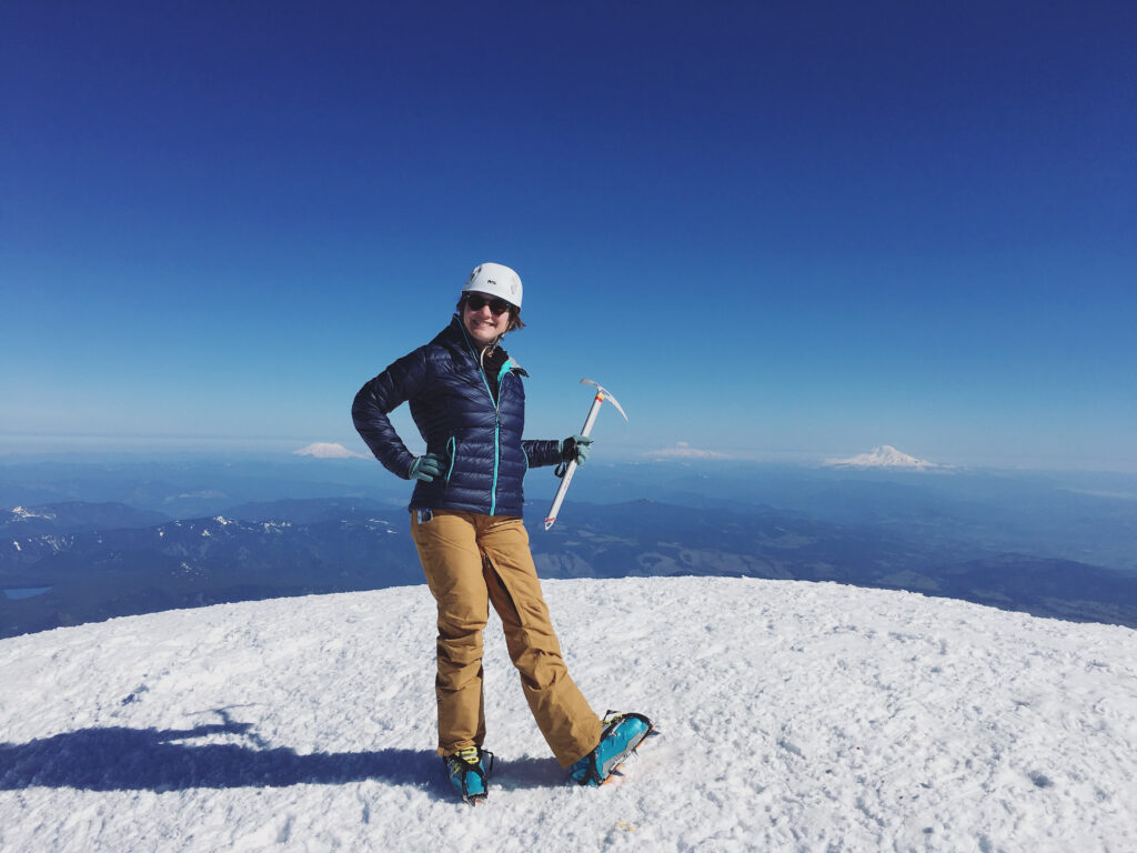Me at the summit of Mt Hood holding my ice axe